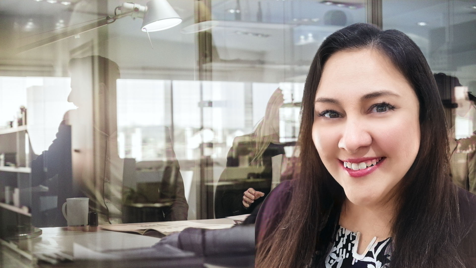 Smiling woman in front of an office